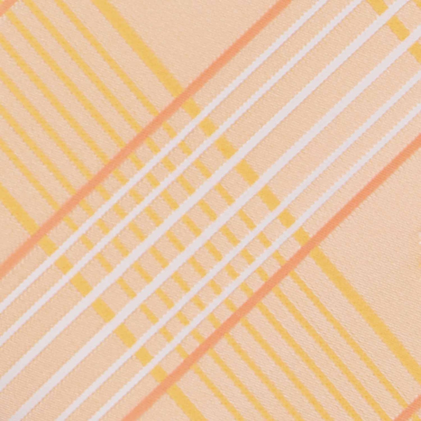 Closeup of an apricot plaid tie